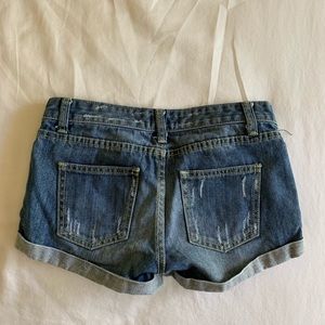 DISTRESSED DENIM SHORTS